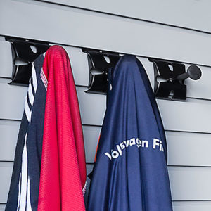 coats hanging on slatwall hooks garage slatwall accessories garment hook