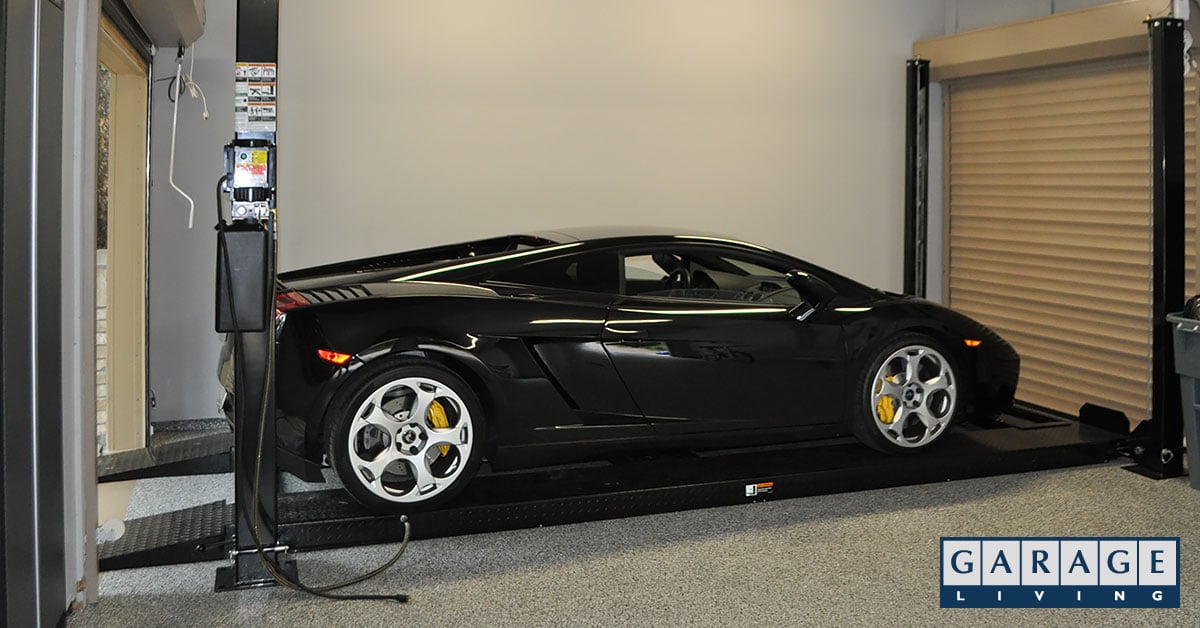 4 post car lift vs 2 post lift black car