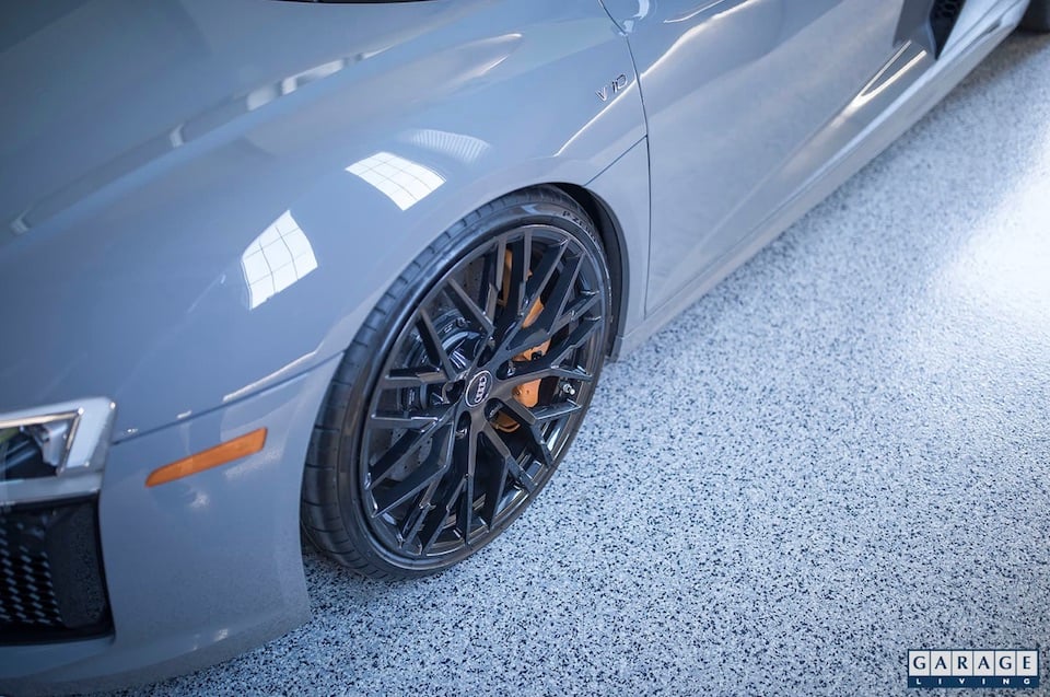 silver car parked in garage