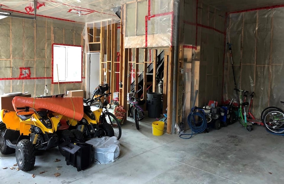 garage before makeover with clutter