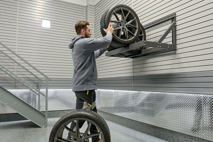 7 Garage Overhead Storage Ideas to Maximize Space and Eliminate Clutter - heavy duty tire rack - Garage Living