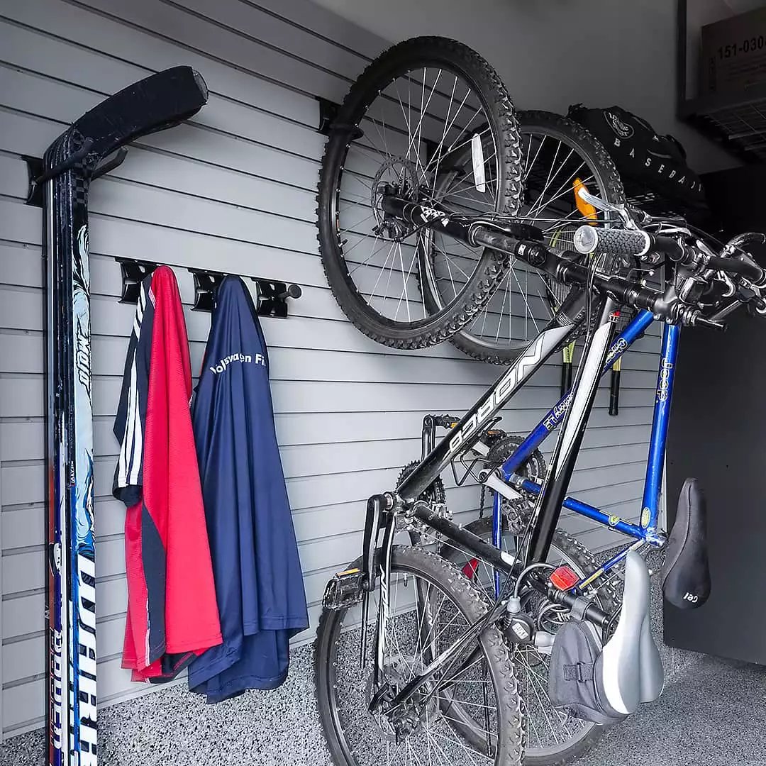 hockey sticks bike racks fitness room garage basketball court garage floor - The Fitness Room Garage - Garage Living