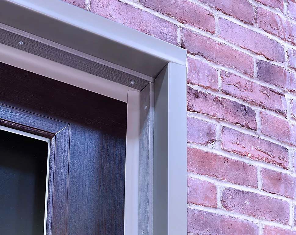 Aluminum capping frame in a Terratone color selected to match the traditional brick color - Garage Living